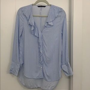 Blue and white striped blouse